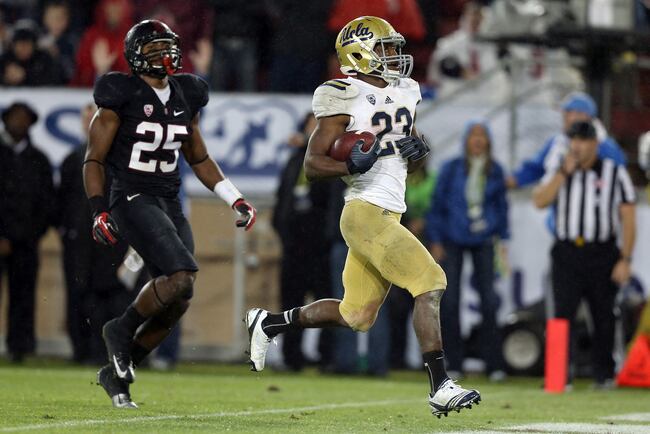 Hi-res-158405260-johnathan-franklin-of-the-ucla-bruins-runs-in-for-a_crop_north