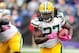 Oct 13, 2013; Baltimore, MD, USA; Green Bay Packers running back Eddie Lacy (27) runs with the ball during the game against the Baltimore Ravens at M&T Bank Stadium. Mandatory Credit: Evan Habeeb-USA TODAY Sports