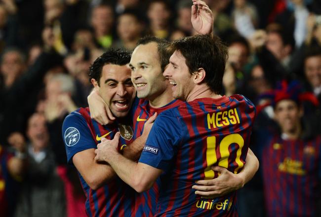 Hi-res-142381684-andres-iniesta-of-fc-barcelona-celebrates-scoring-with_crop_north