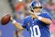 EAST RUTHERFORD, NJ - OCTOBER 06: Eli Manning #10 of the New York Giants looks to pass during the fourth quarter against the Philadelphia Eagles at MetLife Stadium on October 6, 2013 in East Rutherford, New Jersey. The Eagles defeat the Giants 36-21. (Photo by Maddie Meyer/Getty Images)