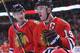 Apr 26, 2013; Chicago, IL, USA; Chicago Blackhawks center Jonathan Toews (19) celebrates scoring a goal with left wing Brandon Saad (20) during the first period against the Calgary Flames at the United Center. Mandatory Credit: Rob Grabowski-USA TODAY Sports