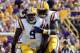 Oct 12, 2013; Baton Rouge, LA, USA; LSU Tigers defensive tackle Ego Ferguson (9) and defensive tackle Anthony Johnson (90) celebrate a defensive play against the Florida Gators during the second quarter of their game at Tiger Stadium. Mandatory Credit: Chuck Cook-USA TODAY Sports