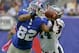 Oct 6, 2013; East Rutherford, NJ, USA; Philadelphia Eagles cornerback Bradley Fletcher (24) breaks up a pass intended for New York Giants wide receiver Rueben Randle (82) during the first half at MetLife Stadium. Mandatory Credit: Jim O'Connor-USA TODAY Sports