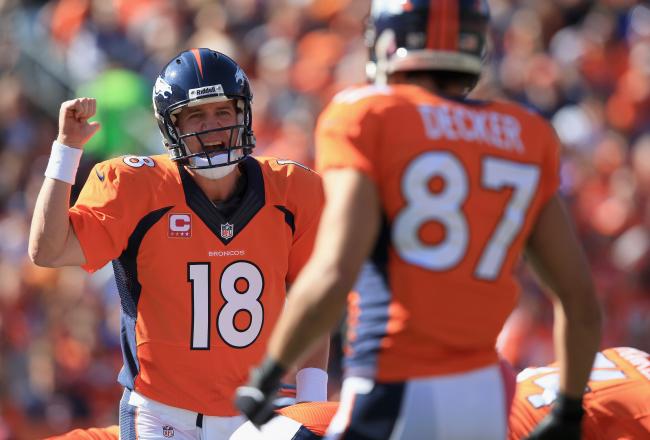 Hi-res-184661998-quarterback-peyton-manning-of-the-denver-bronco-directs_crop_north