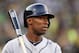 OAKLAND, CA - OCTOBER 10: Austin Jackson #14 of the Detroit Tigers stands on deckk in the fourth inning against the Oakland Athletics during Game Five of the American League Division Series at O.co Coliseum on October 10, 2013 in Oakland, California. (Photo by Thearon W. Henderson/Getty Images)