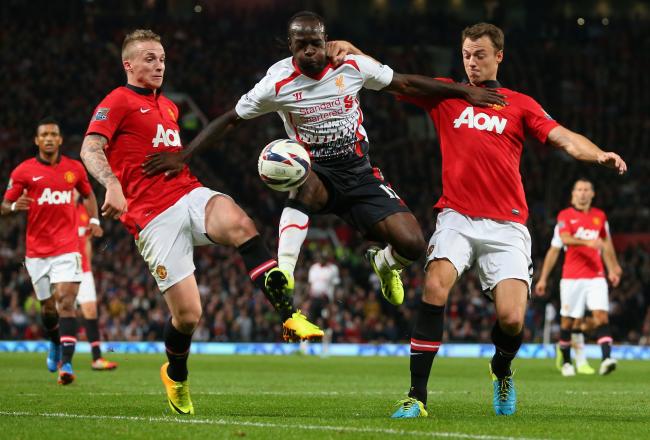 Hi-res-181804785-victor-moses-of-liverpool-is-challenged-by-alex-buttner_crop_north