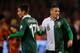 BRUSSELS, BELGIUM - OCTOBER 15: Craig Bellamy (R) and Harry Wilson of Wales shake hands after the FIFA 2014 World Cup Qualifying Group A match between Belgium and Wales at King Baudouin Stadium on October 15, 2013 in Brussels, Belgium. (Photo by Dean Mouhtaropoulos/Getty Images)
