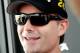 Jeff Gordon smiles while asnwering media questions in Daytona. Credit: Dwight Drum