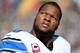 GREEN BAY, WI - OCTOBER 06: Ndamukong Suh #90 of the Detroit Lions on the sidelines during the game against the Green Bay Packers at Lambeau Field on October 6, 2013 in Green Bay, Wisconsin. (Photo by Harry How/Getty Images)
