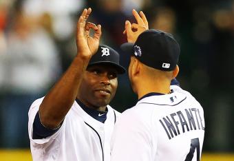 Hi-res-184810585-torii-hunter-of-the-detroit-tigers-celebrates-with-omar_crop_north