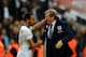 LONDON, ENGLAND - OCTOBER 15: England manager Roy Hodgson shakes hands with Andros Townsend of England as they qualify for the World Cup in Brazil after the FIFA 2014 World Cup Qualifying Group H match between England and Poland at Wembley Stadium on October 15, 2013 in London, England. (Photo by Mike Hewitt/Getty Images)