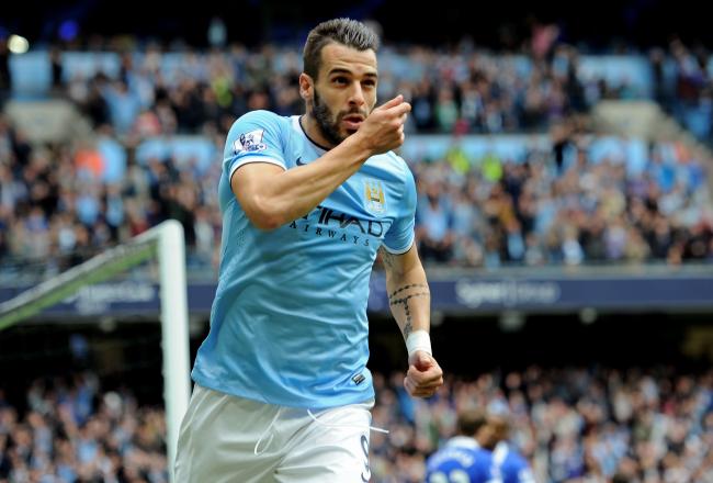 Hi-res-183148179-alvaro-negredo-of-manchester-city-celebrates-after_crop_north
