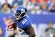 EAST RUTHERFORD, NJ - OCTOBER 06: David Wilson #22 of the New York Giants carries the ball in the first quarter against the Philadelphia Eagles at MetLife Stadium on October 6, 2013 in East Rutherford, New Jersey. (Photo by Elsa/Getty Images)