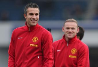 Hi-res-162765370-robin-van-persie-and-wayne-rooney-of-manchester-united_crop_north