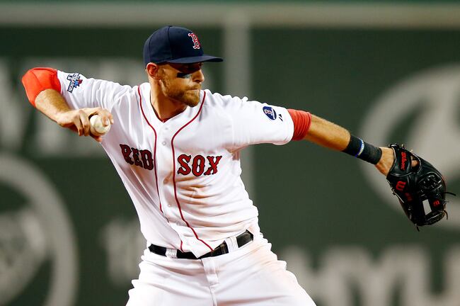 Hi-res-183192033-will-middlebrooks-of-the-boston-red-sox-throws-to-first_crop_north