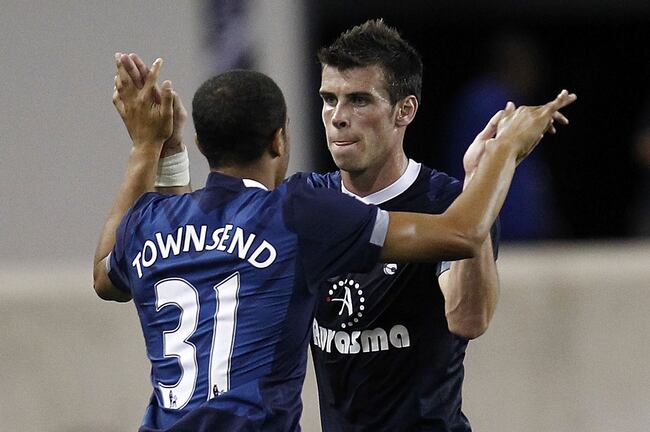 Hi-res-149908475-andros-townsend-of-tottenham-hotspur-greets-gareth-bale_crop_north