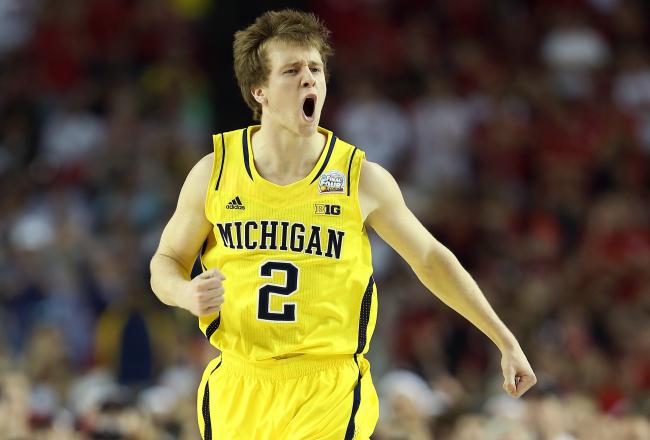 Hi-res-166733685-spike-albrecht-of-the-michigan-wolverines-reacts-after_crop_north