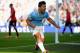 MANCHESTER, ENGLAND - SEPTEMBER 22: Sergio Aguero of Manchester City (16) celebrates as he scores their first goal during the Barclays Premier League match between Manchester City and Manchester United at the Etihad Stadium on September 22, 2013 in Manchester, England. (Photo by Laurence Griffiths/Getty Images)