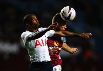 Hi-res-181744724-jermain-defoe-of-tottenham-hotspur-battles-with-nathan_crop_north