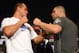 Dec 27, 2012; Las Vegas, NV, USA; UFC fighters Junior Dos Santos (left) and Cain Velasquez (right) square off as they pose for pictures following a press conference for UFC 155 at MGM Grand Garden Arena. Mandatory Credit: Jake Roth-USA TODAY Sports