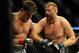 Aug 31, 2013; Milwaukee, WI, USA; Frank Mir (left) fights Josh Barnett during the UFC-164 bout at BMO Harris Bradley Center. Mandatory Credit: Benny Sieu-USA TODAY Sports