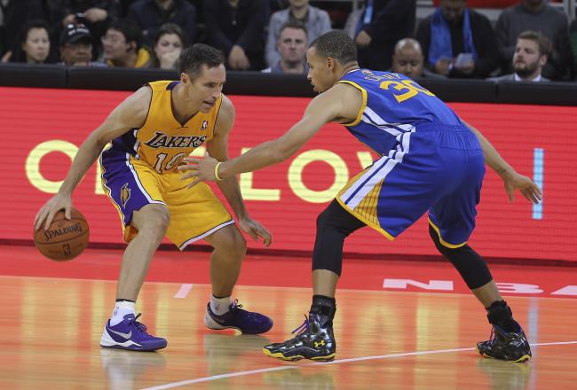 Hi-res-184678482-stephen-curry-of-the-golden-state-warriors-defends_crop_north