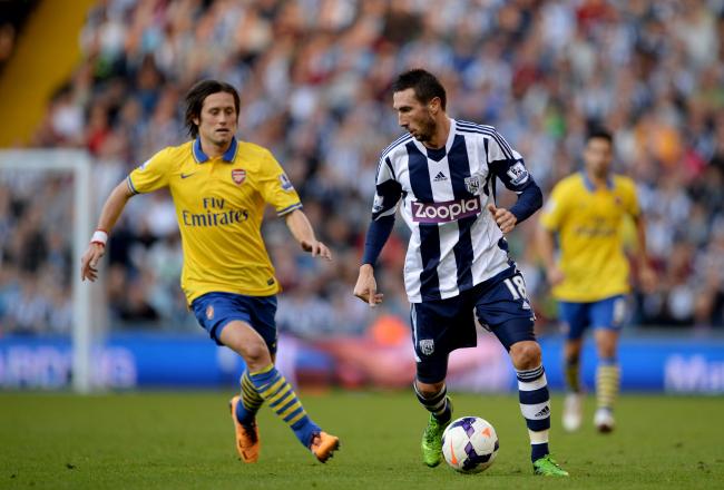 Hi-res-183444215-morgan-amalfitano-of-west-bromwich-albion-is-chased-by_crop_north