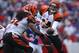 ORCHARD PARK, NY - OCTOBER 13: Andy Dalton #14 of the Cincinnati Bengals hands the ball off to BenJarvus Green-Ellis #42 during NFL game action against the Buffalo Bills at Ralph Wilson Stadium on October 13, 2013 in Orchard Park, New York. (Photo by Tom Szczerbowski/Getty Images)