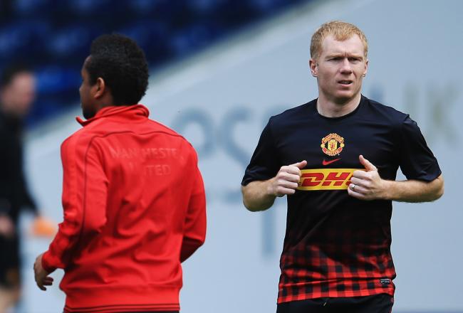 Hi-res-169050351-paul-scholes-of-manchester-united-warms-up-alongside_crop_north