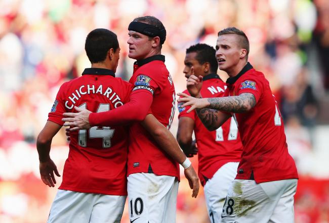 Hi-res-182107196-wayne-rooney-of-manchester-united-celebrates-with-team_crop_north