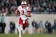EAST LANSING, MI - NOVEMBER 03: Taylor Martinez #3 of the Nebraska Cornhuskers runs for a fourth quarter 35 yard touchdown while playing the Michigan State Spartans at Spartan Stadium Stadium on November 3, 2012 in East Lansing, Michigan. Nebraska won the game 28-24. (Photo by Gregory Shamus/Getty Images)