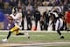 BALTIMORE, MD - DECEMBER 02: Wide receiver Emmanuel Sanders #88 of the Pittsburgh Steelers fumbles the ball after making a catch as free safety Ed Reed #20 of the Baltimore Ravens chases after him during the second half at M&T Bank Stadium on December 2, 2012 in Baltimore, Maryland. (Photo by Rob Carr/Getty Images)