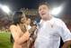 Oct 10, 2013; Los Angeles, CA, USA; Fox Sports sideline reporter Kristina Pink (left) interviews Southern California Trojans interim coach Ed Orgeron after the game against the Arizona Wildcats at Los Angeles Memorial Coliseum. USC defeated Arizona 38-31. Mandatory Credit: Kirby Lee-USA TODAY Sports
