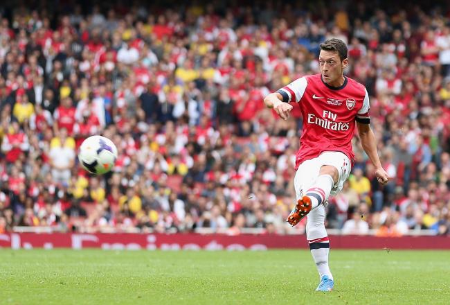 Hi-res-181997819-mesut-oezil-of-arsenal-during-the-barclays-premier_crop_north