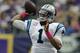 Carolina captain Cam Newton throws a pass vs the Vikings