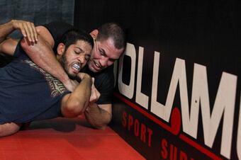 183985051-fighter-cain-velasquez-trains-with-noad-lahat-during-a_crop_north
