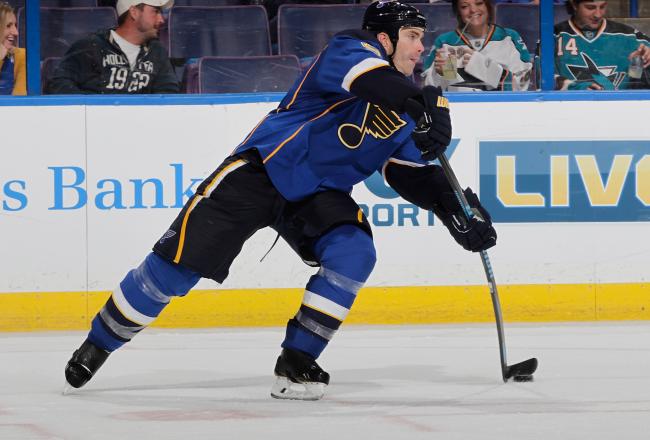Hi-res-184723784-barret-jackman-of-the-st-louis-blues-passes-the-puck_crop_north