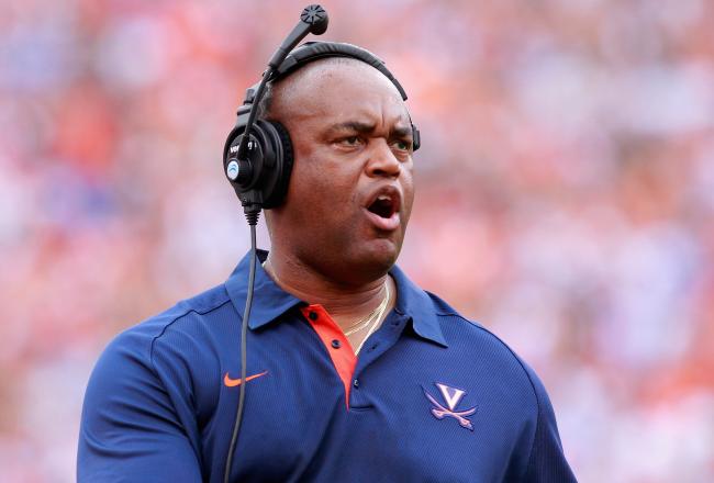 Hi-res-151122052-virginia-cavaliers-head-coach-mike-london-watches-from_crop_north
