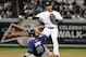 Sep 26, 2013; Bronx, NY, USA; New York Yankees second baseman Robinson Cano (24) completes a double play over Tampa Bay Rays second baseman Ben Zobrist (18) at Yankee Stadium. Mandatory Credit: William Perlman/THE STAR-LEDGER via USA TODAY Sports