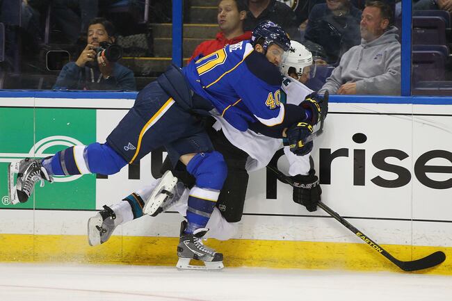 Hi-res-184715885-maxim-lapierre-of-the-st-louis-blues-checks-dan-boyle_crop_north