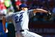 ST LOUIS, MO - OCTOBER 12: Clayton Kershaw #22 of the Los Angeles Dodgers pitches in the first inning against the St. Louis Cardinals during Game Two of the National League Championship Series at Busch Stadium on October 12, 2013 in St Louis, Missouri. (Photo by Elsa/Getty Images)