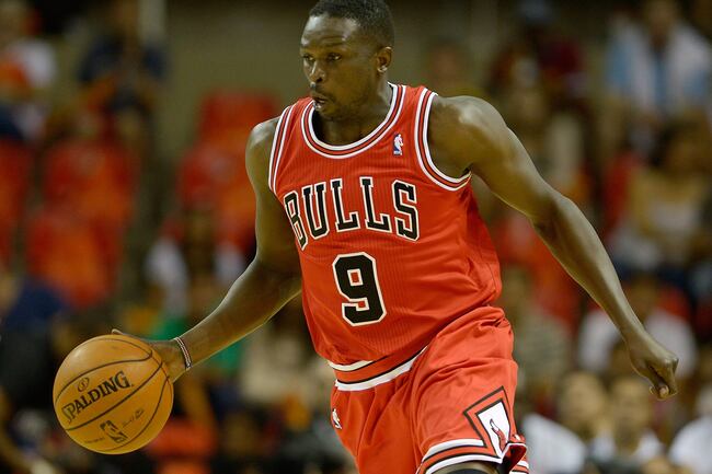 Hi-res-184242265-luol-deng-of-the-chicago-bulls-drives-during-chicago_crop_north