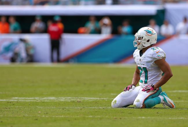 Hi-res-183457042-brent-grimes-of-the-miami-dolphins-reacts-to-a-play_crop_north