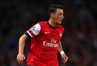 Hi-res-182607036-mesut-oezil-of-arsenal-runs-with-the-ball-during-uefa_crop_north