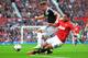 MANCHESTER, ENGLAND - OCTOBER 19: Jay Rodriguez of Southampton is tackled by Robin Van Persie of Manchester United during the Barclays Premier League match between Manchester United and Southampton at Old Trafford on October 19, 2013 in Manchester, England. (Photo by Shaun Botterill/Getty Images)