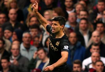 Hi-res-185350365-sergio-aguero-of-manchester-city-celebrates-scoring-the_crop_north