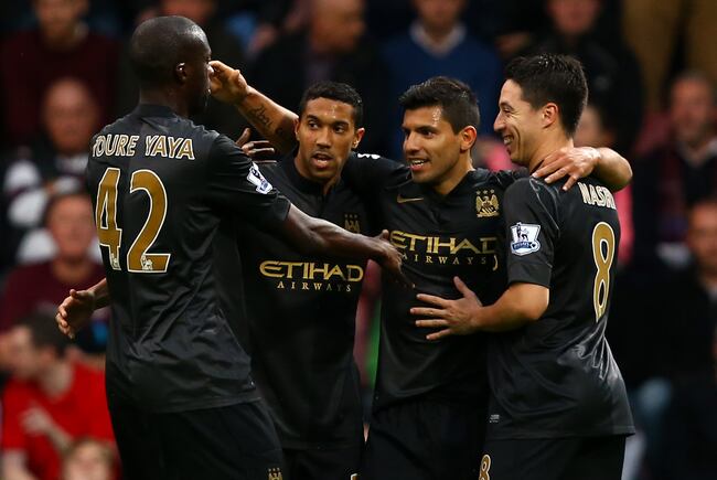 Hi-res-185355028-sergio-aguero-of-manchester-city-celebrates-his-opening_crop_north