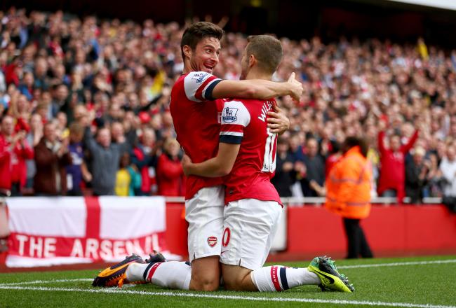 Hi-res-185347080-jack-wilshere-of-arsenal-celebrates-with-olivier-giroud_crop_north