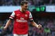 LONDON, ENGLAND - OCTOBER 19: Mesut Oezil of Arsenal celebrates as he scores their second goal during the Barclays Premier League match between Arsenal and Norwich City at Emirates Stadium on October 19, 2013 in London, England. (Photo by Paul Gilham/Getty Images)