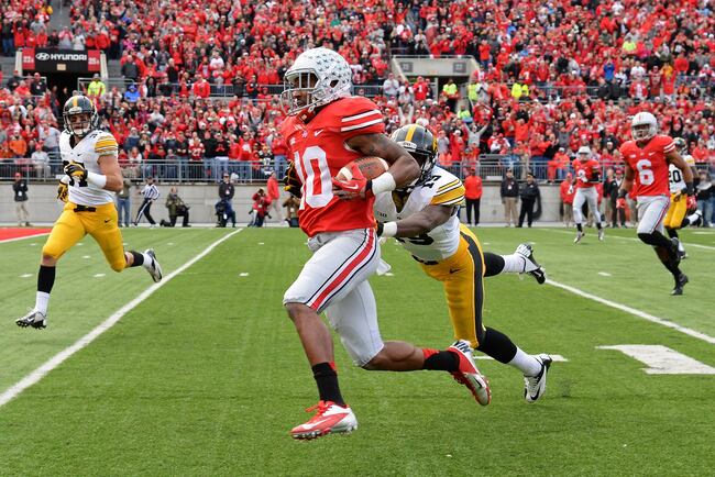 Hi-res-185359587-philly-brown-of-the-ohio-state-buckeyes-eludes-the_crop_north